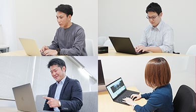 映像を確認して現場と通話する本部社員